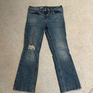 Pilcro crop kick flare lower rise